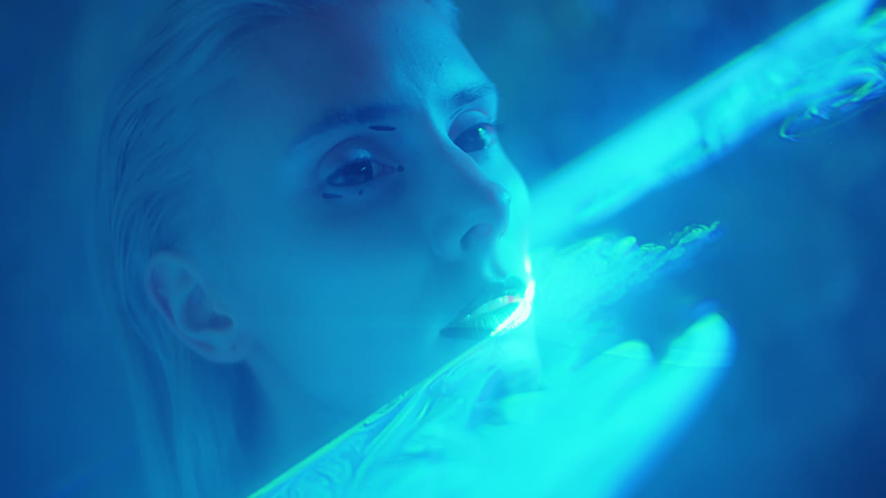 Gothic Woman Posing in Laser Light