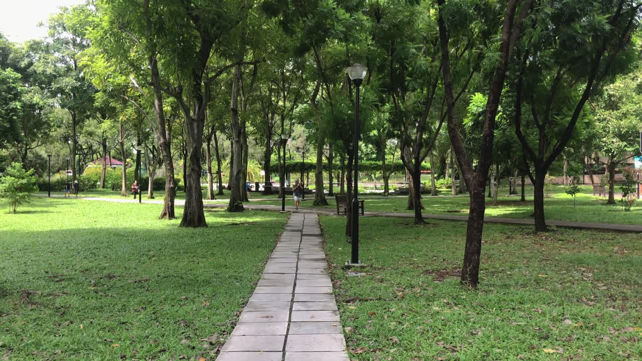 People walking at Toa Payoh Park, Singapore, during circuit breaker