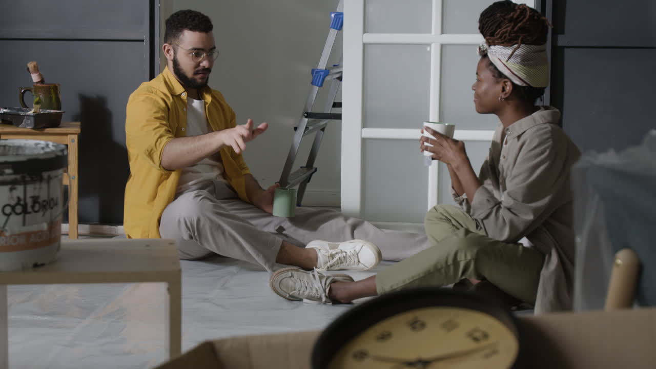 Couple Taking a Break From Painting