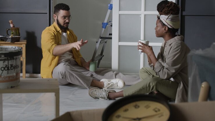 Couple Taking a Break From Painting