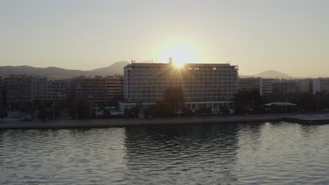 Aerial---Sunrise-shot-of-Makedonia-Palace-in-Thessaloniki