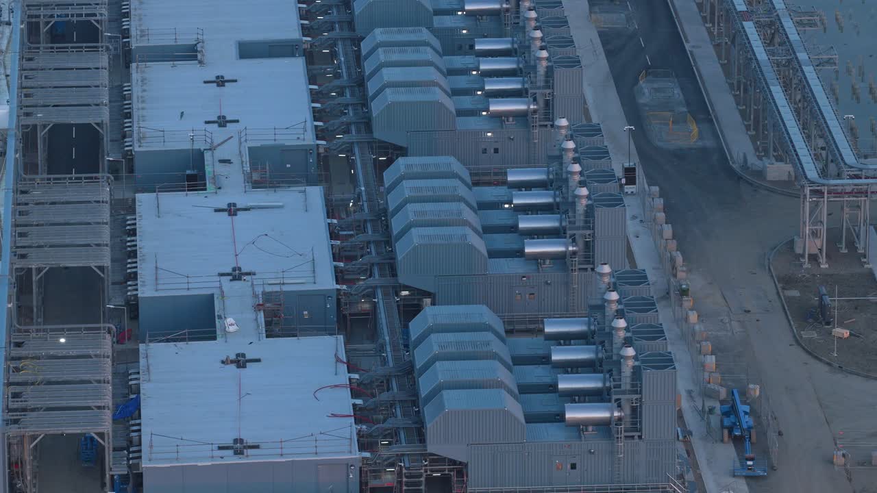 Aerial view of a large scale hyperscale data center under construction. Modern industrial facility for cloud computing and big data storage