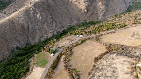 Topdown-view-of-semi-populated-road-in-precordillera-remote-location,-Northern-Chile-Landscape