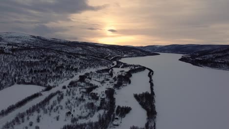 Aerial-view-of-frozen-Teno-river-in-lapland-near-Karigasniemi-town