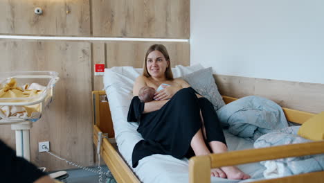 newborn baby and parents in hospital