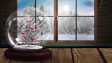 Animation-of-snow-globe-with-christmas-tree-and-winter-scenery-with-snow-falling-seen-through-window