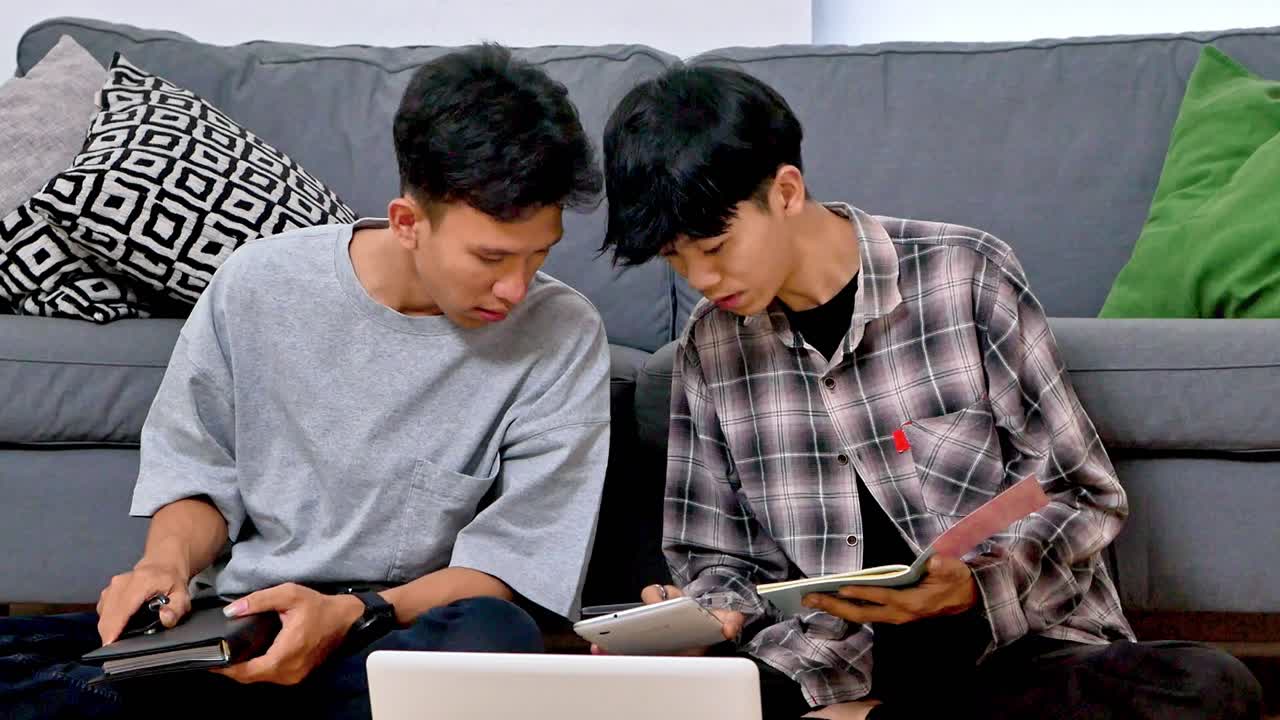 Young student explaining project ideas with notebook engaged in lively discussion and learning