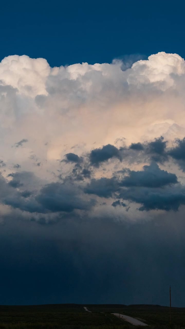 Flashing lightning in a night time severe weather storm dramatic weather scene