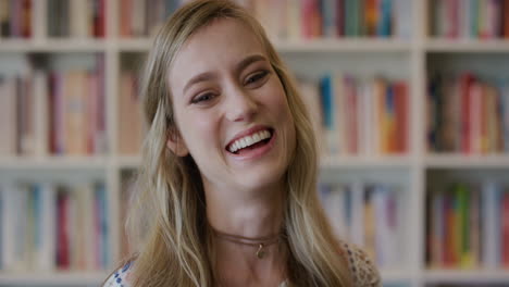 portrait young beautiful blonde woman student laughing enjoying successful lifestyle happy cheerful college girl in bookshelf background slow motion