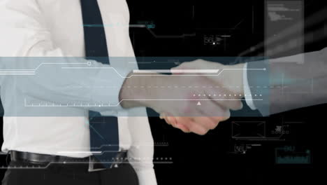 digital interface with data processing against mid section of two businessmen shaking hands