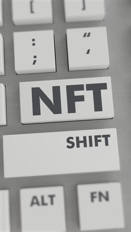 el botón nft presionado en el teclado vídeo vertical