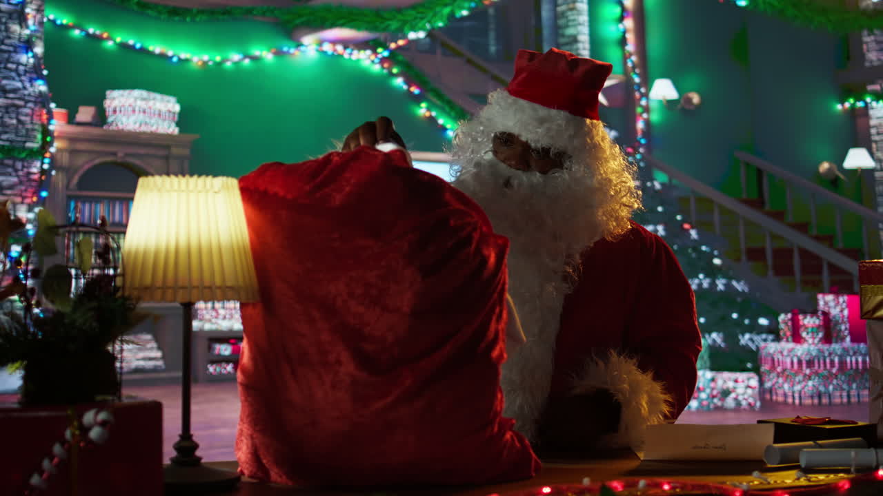 Santa Claus in his office preparing for Christmas