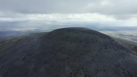 barren tundra hill in central norway has commanding landscape views