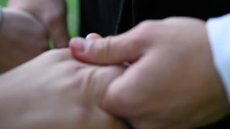 bride and groom holding hands