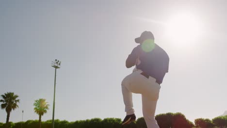 baseball player throwing a ball during a match