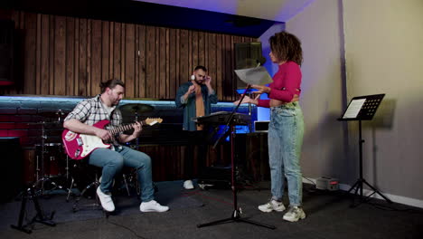 musical group in the studio