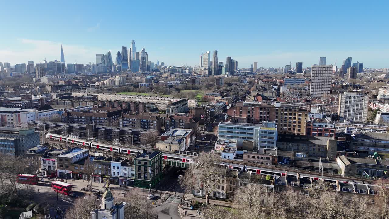 Train on Overground railway line Bethnal Green East London UK drone,aerial