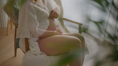 close-up of pregnant woman's belly