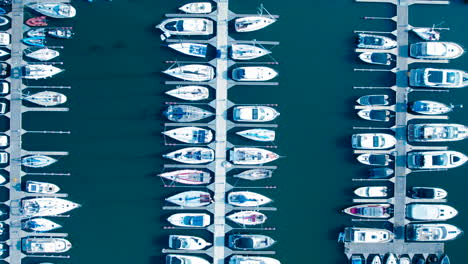 Aerial-view-of-docked-boats-in-a-neat-row-in-modern-marine-in-Gdynia