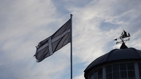 saint piran cornwall flag waving in the wind, in slow motion