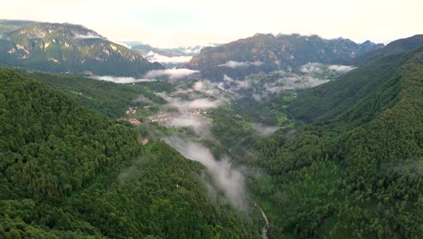 aerial view of a foggy mountain valley