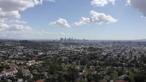 Wide-angle-establishing-aerial-shot-of-downtown-Los-Angeles-in-summer-sun