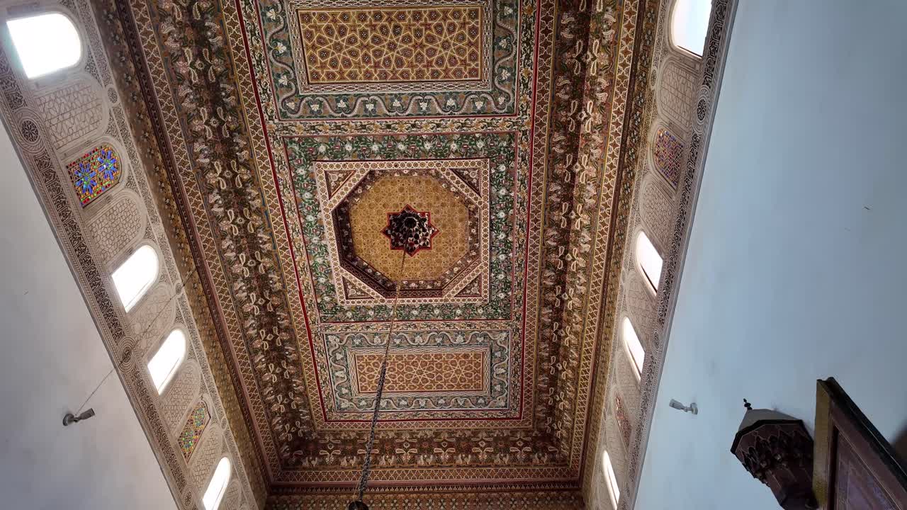 Decorated roof with wood carving and Islamic art, riad in Morocco