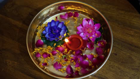 decorated flowers kept in copper plat at festival at home form top angle