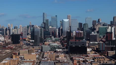 beautiful drone shot reveals chicago city skyline on clear afternoon