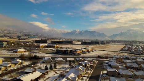 panoramic aerial view of lehi, utah with fresh layer of snow and a view of silicon slopes