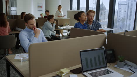 multi ethnic coworkers working in open space. business people working in office