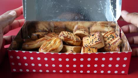 a red polka dot box of cookies