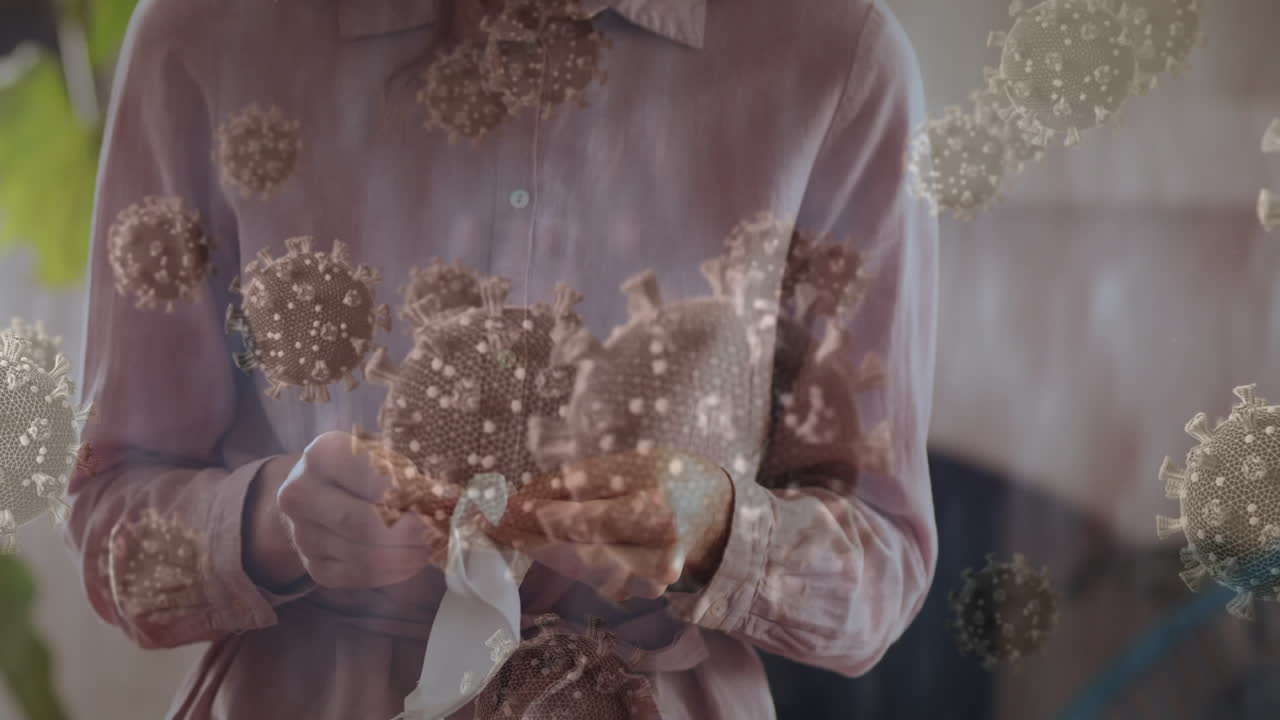 코로나 19 세포의 애니메이션이 마스크를  ⁇ 는 사람 위에