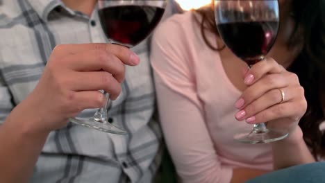 asian happy couple drinking wine