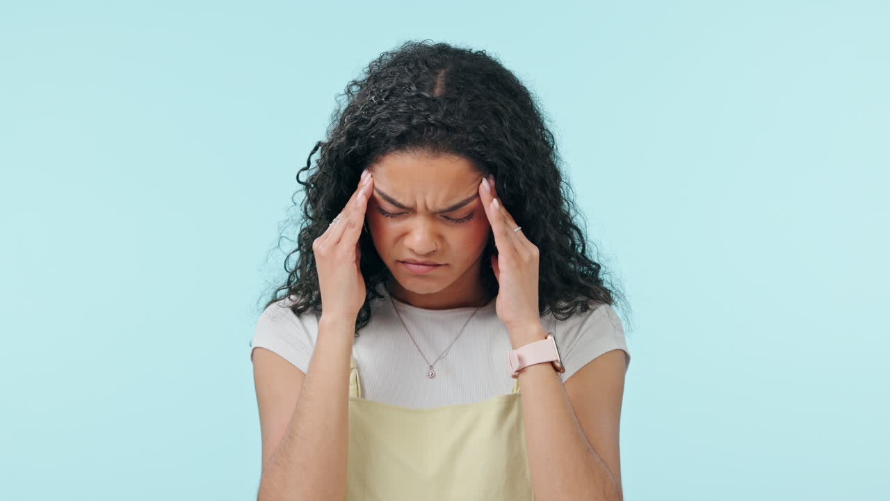 Woman, headache and anxiety