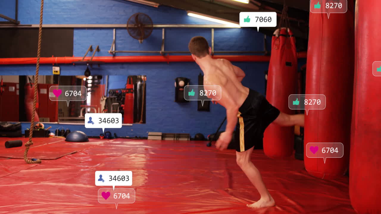 Practicing martial arts in gym, man surrounded by social media animation icons