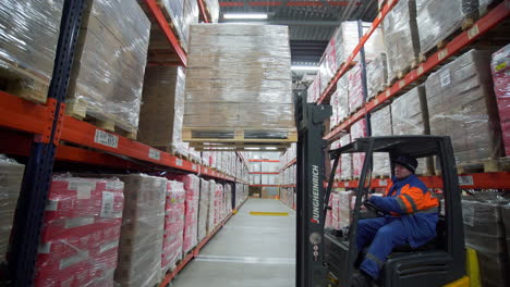 forklift operating in a high-bay warehouse