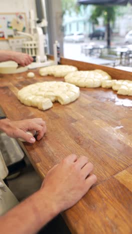 bakery staff preparing dough