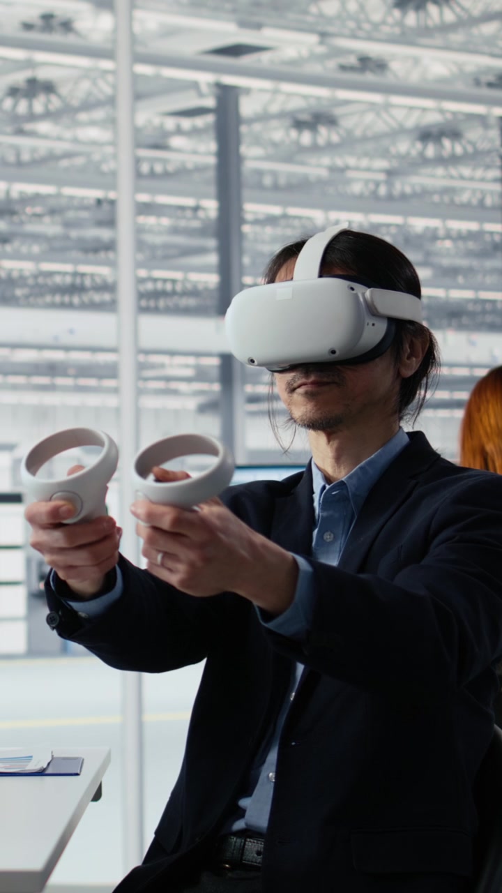Vertical video Engineer using VR technology to optimize microchip production in factory