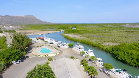 aerial view of luxury yachts at club nautico de monte cristi, boat club in dominican republic