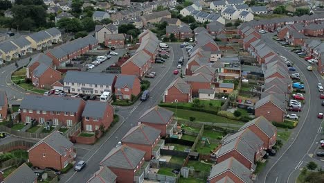 aerial view over port of holyhead suburban town neighbourhood brick house property in north wales