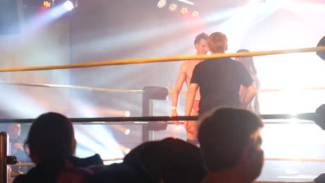 wrestling champions celebrate victory in the ring
