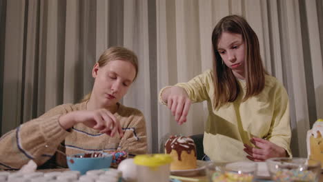 sisters decorating easter bread