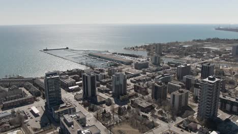 flying over downtown mississauga near lake ontario on a winter day