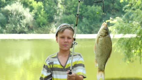 boy fishing on a lake