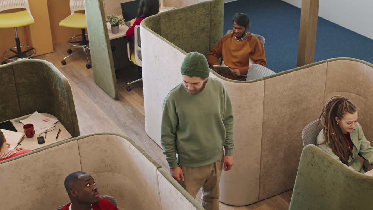 Slowmo of Executive on Self-Balancing Scooter in Office