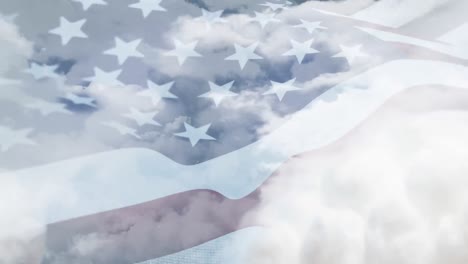 american flag waving in a cloudy sky