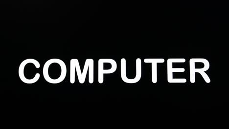 escribir en la pantalla con un párrafo intermitente que forma la palabra computadora, en blanco sobre un fondo negro