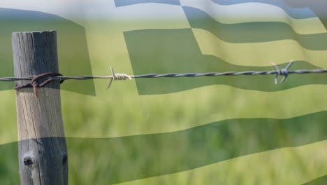 barbed wires against greece flag