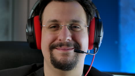 close up of a smiling call center operator wearing a headset